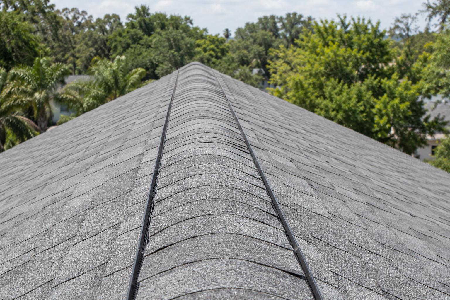Detailed view of a ridge vent installed on a Florida roof
